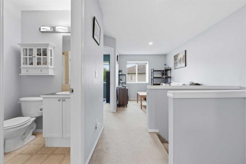 402-703 Luxstone Square Sw, Airdrie, AB - Indoor Photo Showing Other Room