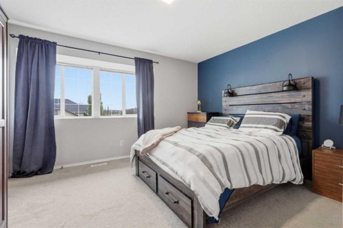 402-703 Luxstone Square Sw, Airdrie, AB - Indoor Photo Showing Bedroom