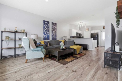 402-703 Luxstone Square Sw, Airdrie, AB - Indoor Photo Showing Living Room