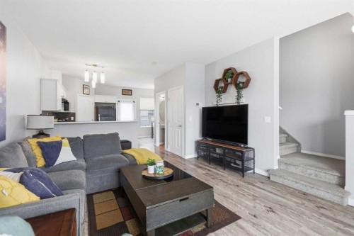 402-703 Luxstone Square Sw, Airdrie, AB - Indoor Photo Showing Living Room