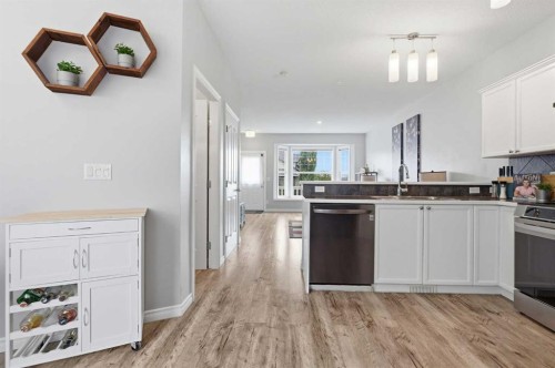 402-703 Luxstone Square Sw, Airdrie, AB - Indoor Photo Showing Kitchen