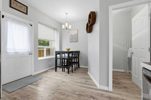402-703 Luxstone Square Sw, Airdrie, AB - Indoor With Fireplace