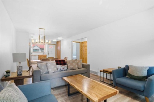 114-1720 Bow Valley Trail, Canmore, AB - Indoor Photo Showing Living Room