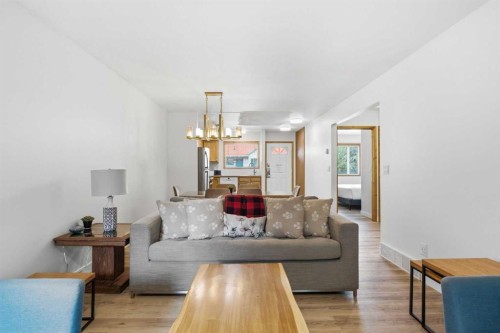 114-1720 Bow Valley Trail, Canmore, AB - Indoor Photo Showing Living Room