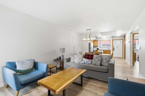 114-1720 Bow Valley Trail, Canmore, AB - Indoor Photo Showing Living Room