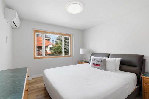 114-1720 Bow Valley Trail, Canmore, AB - Indoor Photo Showing Bedroom