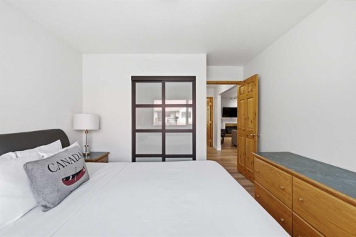 114-1720 Bow Valley Trail, Canmore, AB - Indoor Photo Showing Bedroom