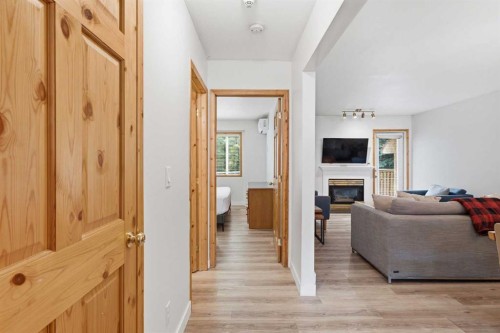 114-1720 Bow Valley Trail, Canmore, AB - Indoor With Fireplace