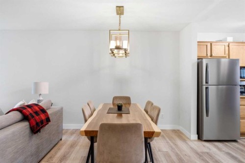 114-1720 Bow Valley Trail, Canmore, AB - Indoor Photo Showing Dining Room