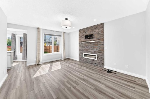 147 Macewan Drive Nw, Calgary, AB - Indoor With Fireplace