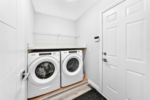 147 Macewan Drive Nw, Calgary, AB - Indoor Photo Showing Laundry Room