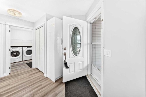 147 Macewan Drive Nw, Calgary, AB - Indoor Photo Showing Laundry Room