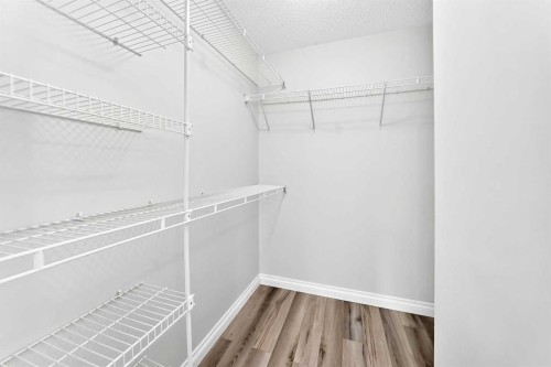 147 Macewan Drive Nw, Calgary, AB - Indoor With Storage