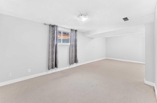 147 Macewan Drive Nw, Calgary, AB - Indoor Photo Showing Other Room