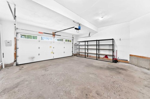 147 Macewan Drive Nw, Calgary, AB - Indoor Photo Showing Garage