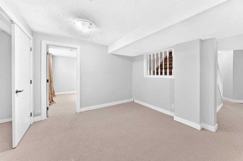 147 Macewan Drive Nw, Calgary, AB - Indoor Photo Showing Other Room