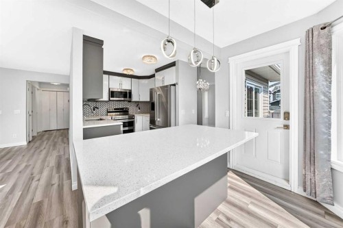 147 Macewan Drive Nw, Calgary, AB - Indoor Photo Showing Kitchen With Upgraded Kitchen