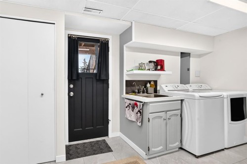 6216 Touchwood Drive Nw, Calgary, AB - Indoor Photo Showing Laundry Room