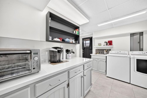 6216 Touchwood Drive Nw, Calgary, AB - Indoor Photo Showing Laundry Room