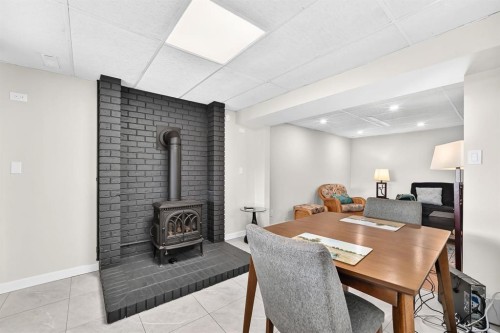 6216 Touchwood Drive Nw, Calgary, AB - Indoor With Fireplace