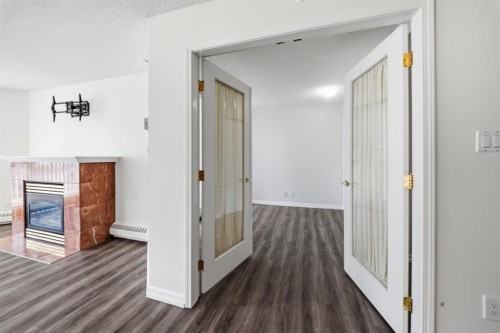 804-804 3 Avenue Sw, Calgary, AB - Indoor With Fireplace