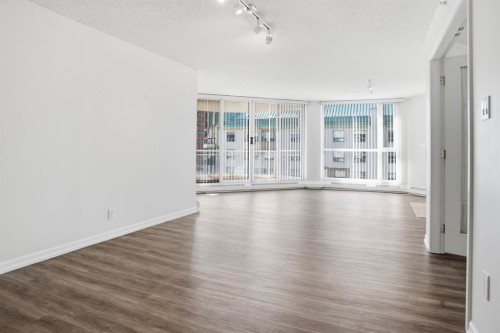804-804 3 Avenue Sw, Calgary, AB - Indoor Photo Showing Living Room With Fireplace