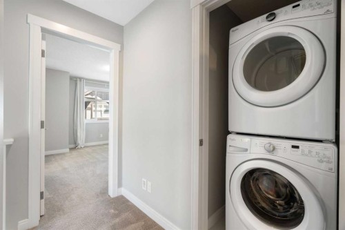 124 Wentworth Row Sw, Calgary, AB - Indoor Photo Showing Laundry Room