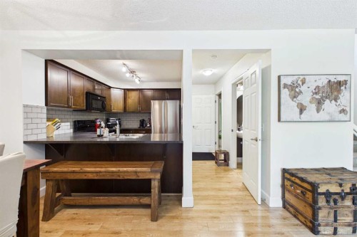 936 Windsong Drive Sw, Airdrie, AB - Indoor Photo Showing Kitchen