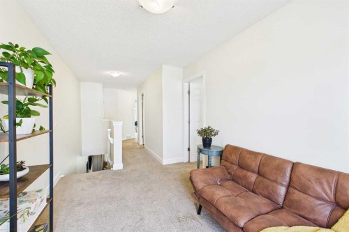 936 Windsong Drive Sw, Airdrie, AB - Indoor Photo Showing Living Room