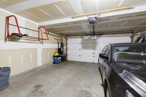 936 Windsong Drive Sw, Airdrie, AB - Indoor Photo Showing Garage