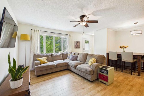936 Windsong Drive Sw, Airdrie, AB - Indoor Photo Showing Living Room