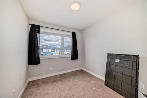 73 Homestead Boulevard Ne, Calgary, AB - Indoor Photo Showing Other Room
