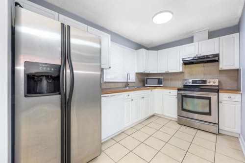 5071 Whitestone Way Ne, Calgary, AB - Indoor Photo Showing Kitchen