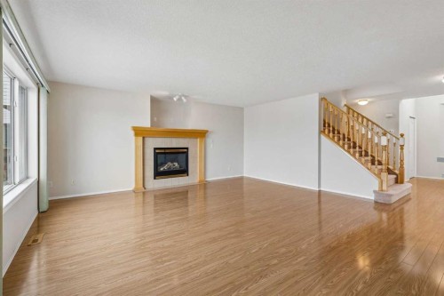 41 Panorama Hills Way Nw, Calgary, AB - Indoor Photo Showing Living Room With Fireplace