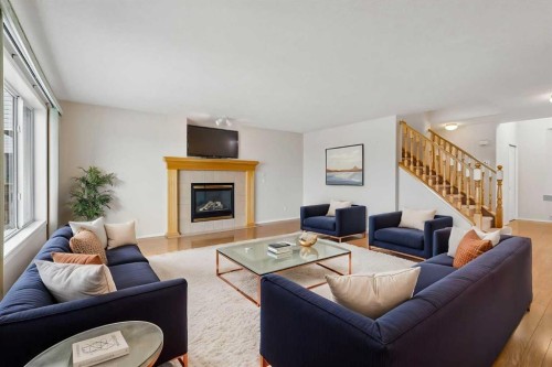 41 Panorama Hills Way Nw, Calgary, AB - Indoor Photo Showing Living Room With Fireplace