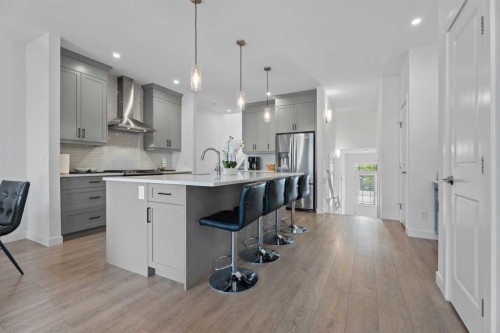 19 Cranbrook Gardens Se, Calgary, AB - Indoor Photo Showing Kitchen With Upgraded Kitchen