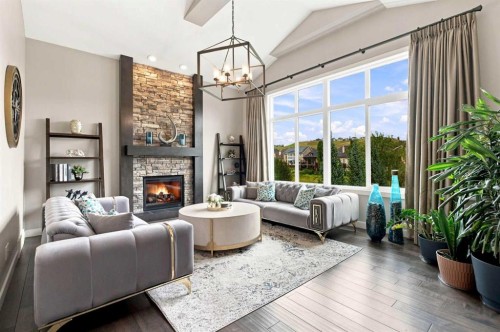 699 Cranston Avenue Se, Calgary, AB - Indoor Photo Showing Living Room With Fireplace