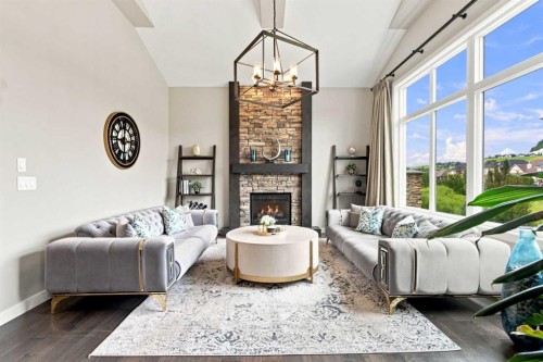 699 Cranston Avenue Se, Calgary, AB - Indoor Photo Showing Living Room With Fireplace