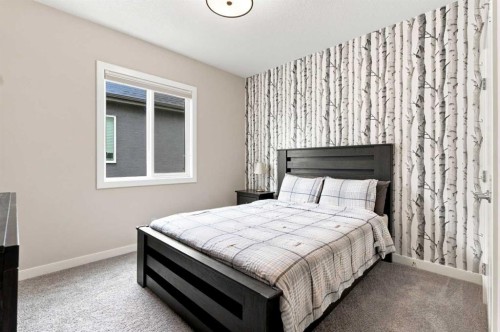 699 Cranston Avenue Se, Calgary, AB - Indoor Photo Showing Bedroom