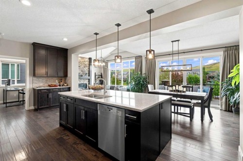 699 Cranston Avenue Se, Calgary, AB - Indoor Photo Showing Kitchen With Double Sink With Upgraded Kitchen