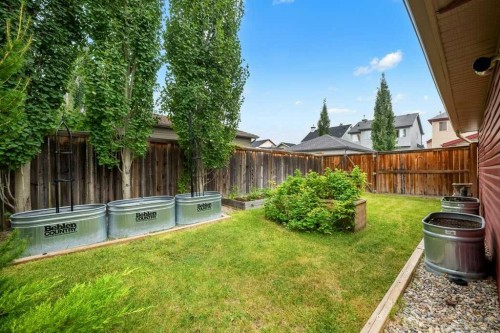 284 Prestwick Estate Way Se, Calgary, AB - Outdoor With Backyard