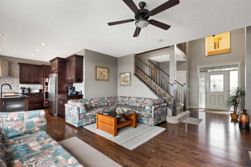 159 Sunset View, Cochrane, AB - Indoor Photo Showing Living Room