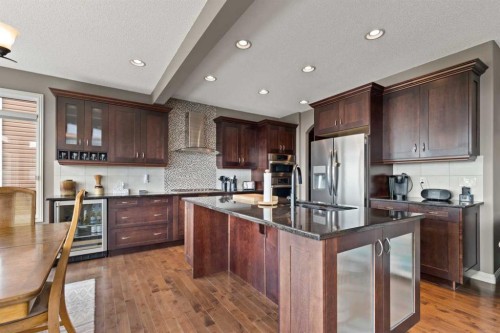 159 Sunset View, Cochrane, AB - Indoor Photo Showing Kitchen With Stainless Steel Kitchen