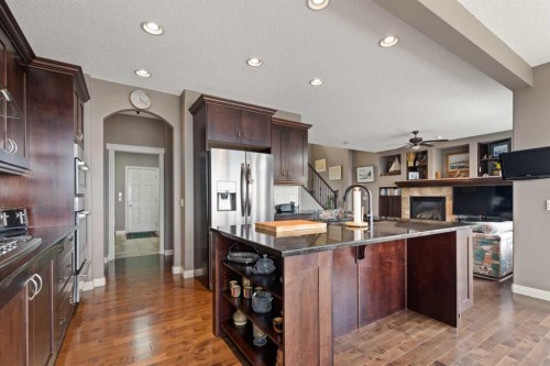 159 Sunset View, Cochrane, AB - Indoor Photo Showing Kitchen With Stainless Steel Kitchen With Upgraded Kitchen