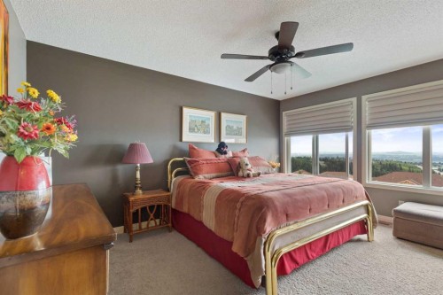 159 Sunset View, Cochrane, AB - Indoor Photo Showing Bedroom