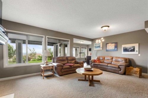 159 Sunset View, Cochrane, AB - Indoor Photo Showing Living Room