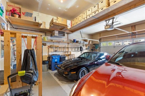159 Sunset View, Cochrane, AB - Indoor Photo Showing Garage