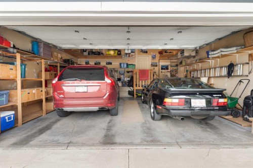 159 Sunset View, Cochrane, AB - Indoor Photo Showing Garage