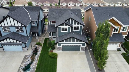 159 Sunset View, Cochrane, AB - Outdoor With Facade