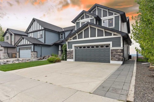 159 Sunset View, Cochrane, AB - Outdoor With Facade